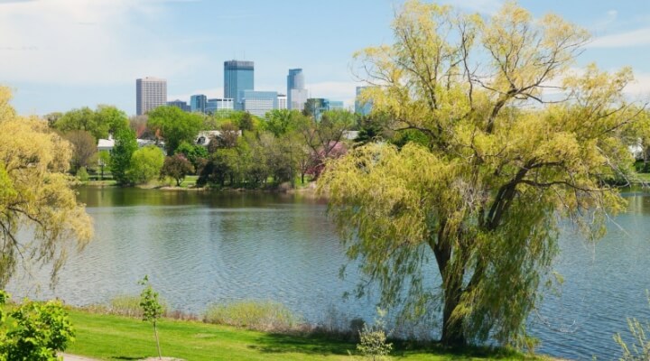 the lake with a shot of the skyline behind it