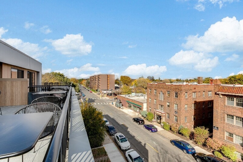 a view of the street from the balcony